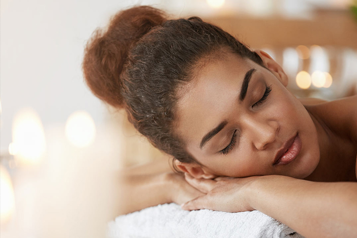 lady  being massage at sugar cane spa